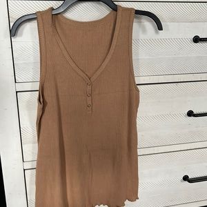 Button tank that’s never been worn